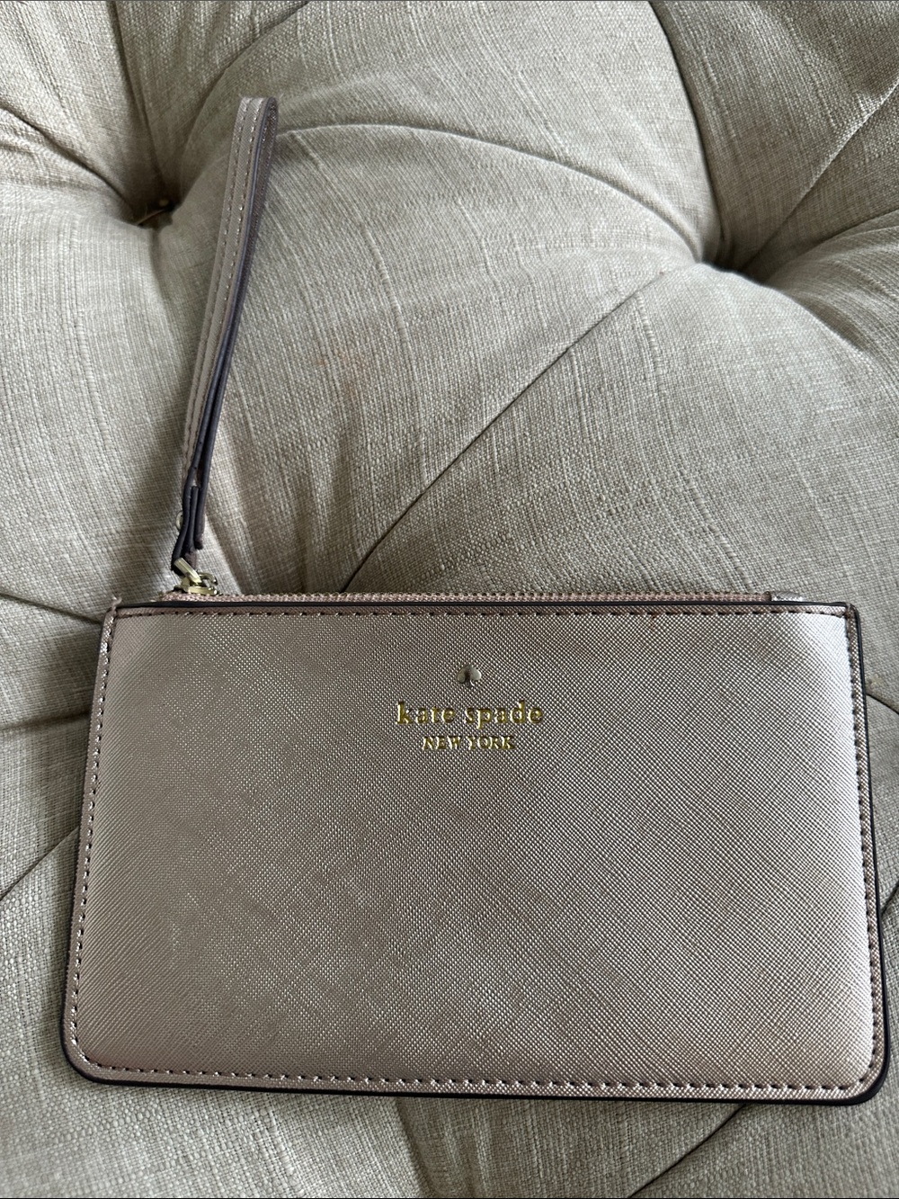 kate spade Taupe Leather Wristlet with Gold Logo